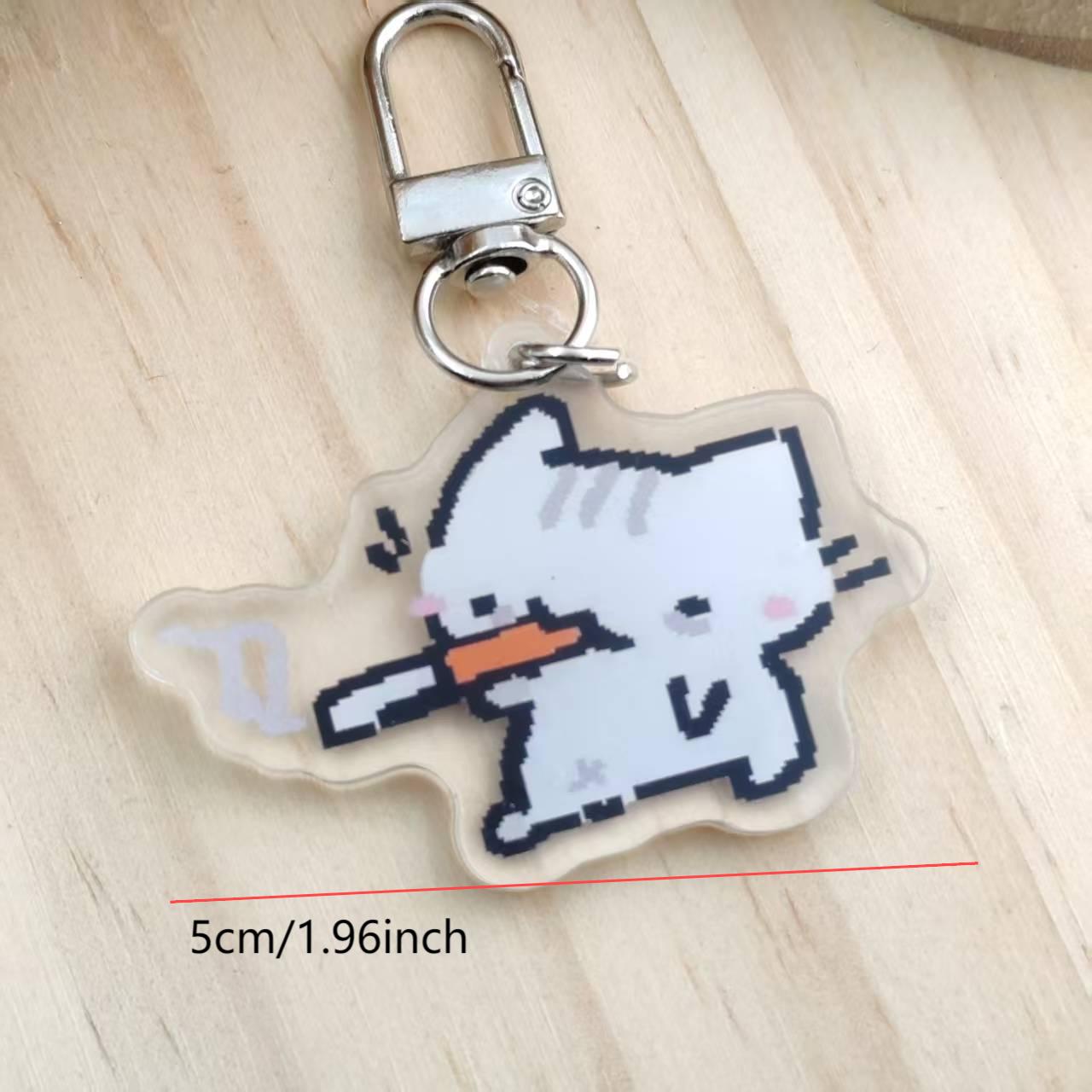 سلسلة مفاتيح على شكل قطة بكسل  - مراجعة Retro Gaming Gifts وسعره